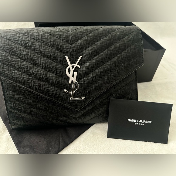 Yves Saint Laurent Handbags - Beautiful authentic YSL black clutch